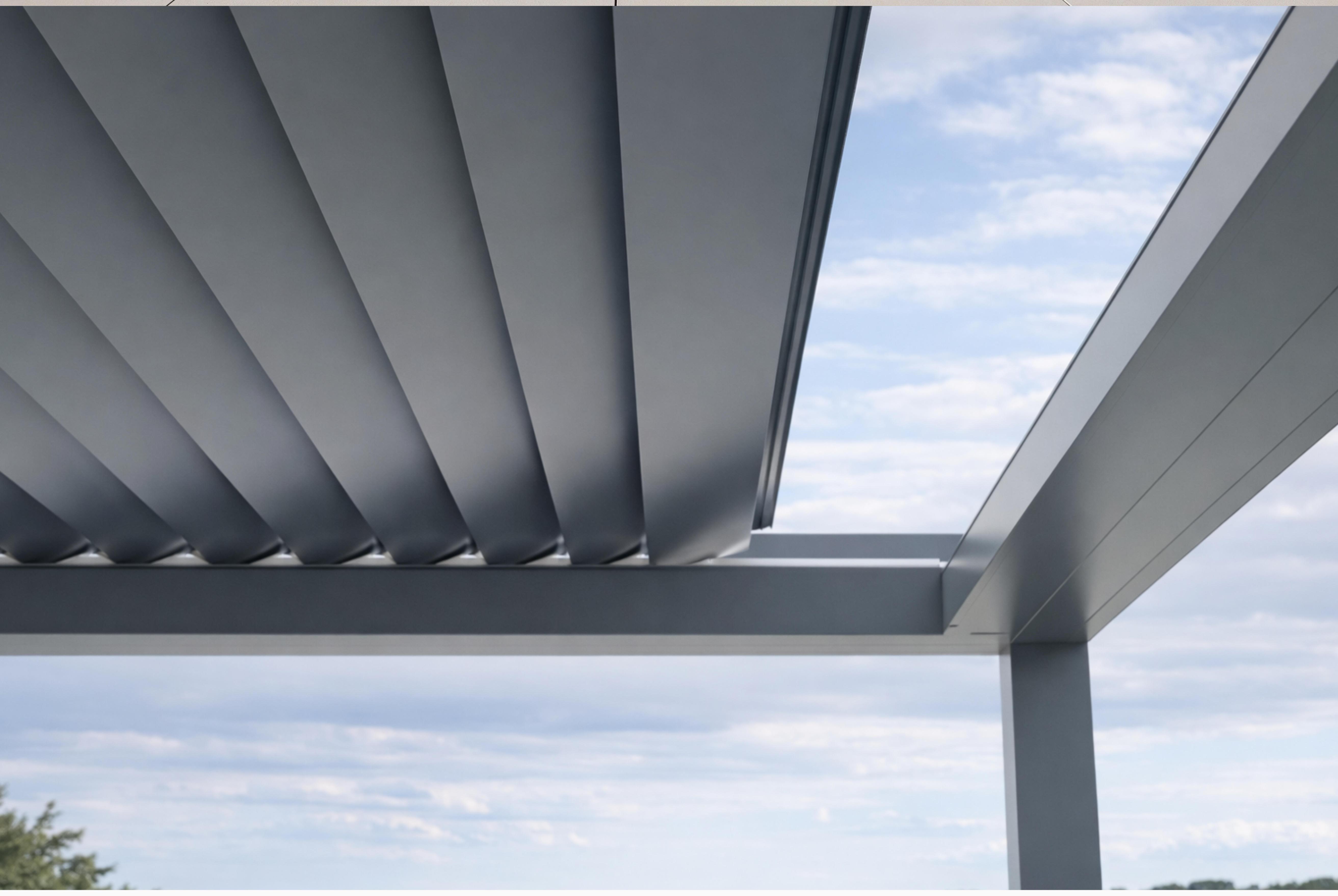 Motorised rotating louver pergola roof system controlling sunlight and ventilation in a modern aluminium pergola
